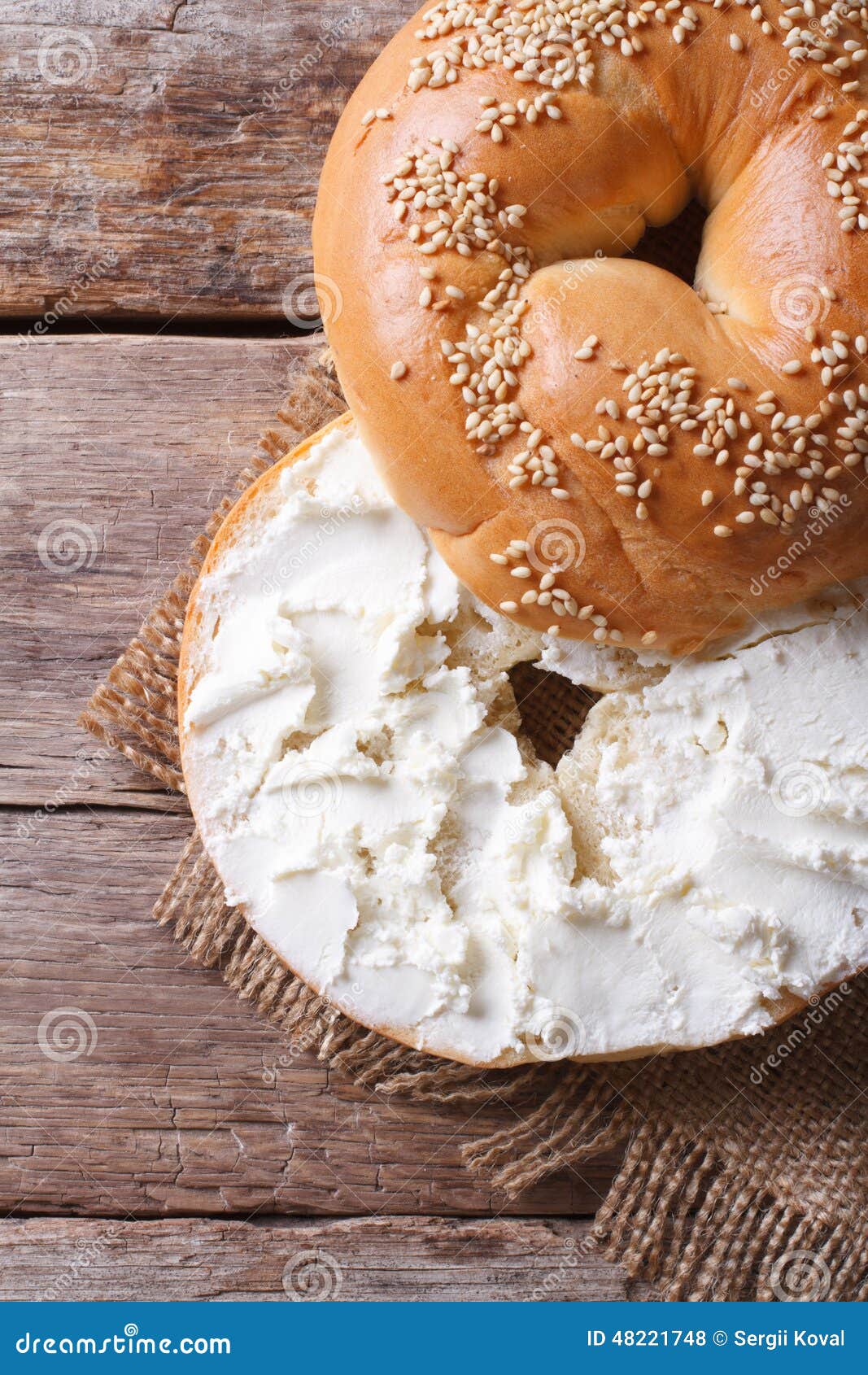 Bagel With Cream Cheese Close-up Top View Of The Vertical Stock Photo - Image of grain, lunch ...