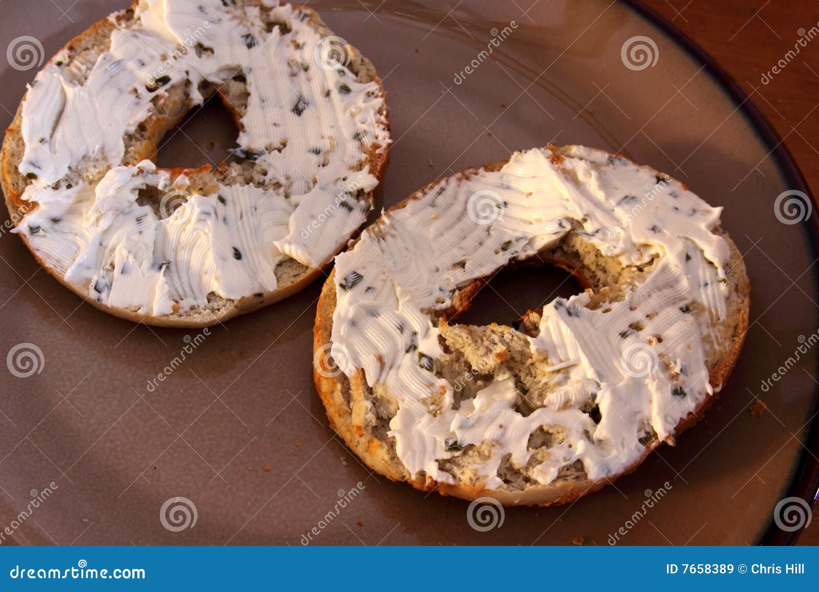 Bagel with Cream Cheese Spread Stock Image Image of plate, toast 7658389