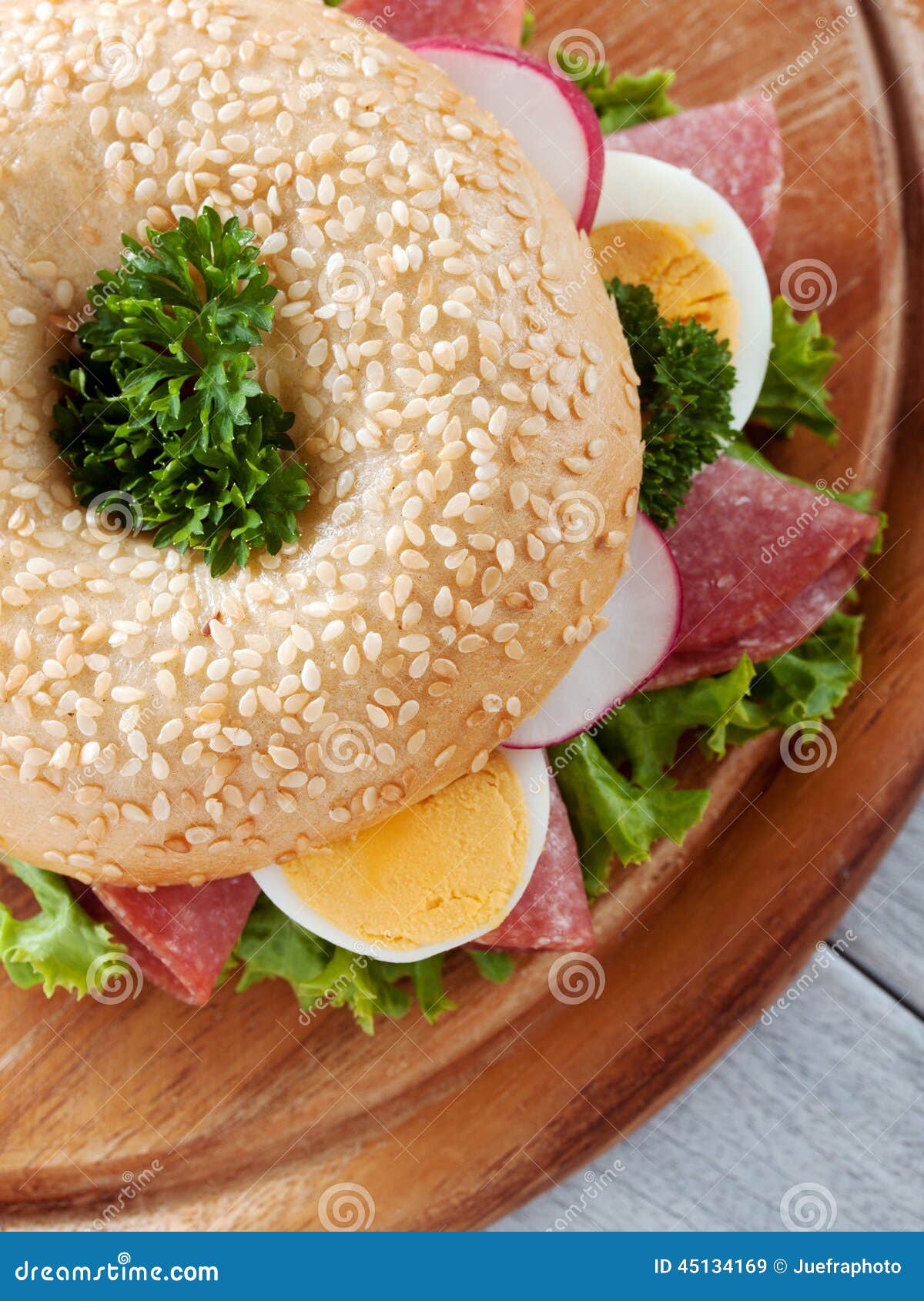 Bagel with egg and salami stock image. Image of goods 45134169
