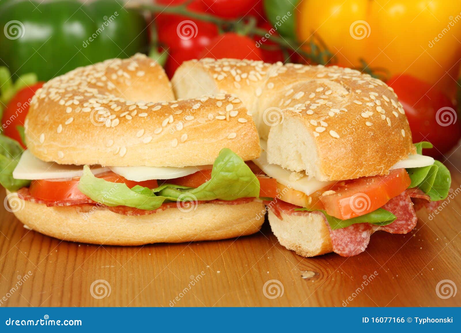 Bagel with salami stock photo. Image of tomatoes, wooden 16077166