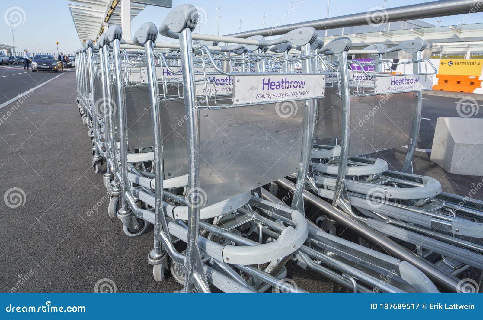 Baggage Carts at London Heathrow Airport LONDON, ENGLAND SEPTEMBER