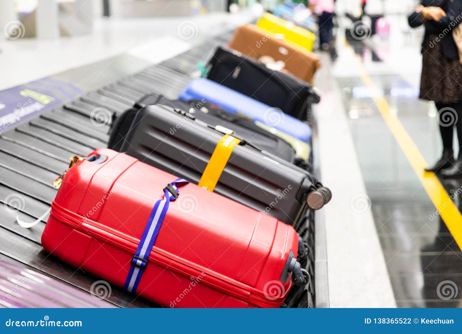 baggage luggage on conveyor carousel belt at airport arrival