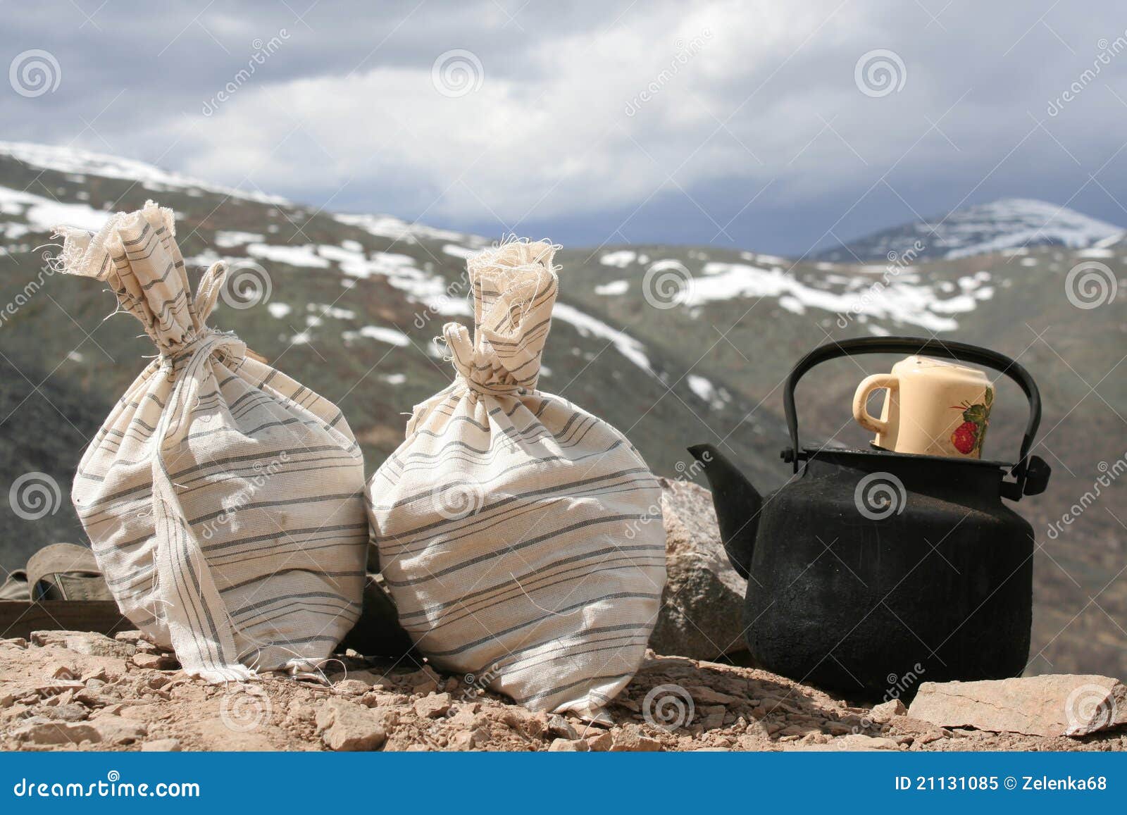 bags with test of the mountain sorts and teapot