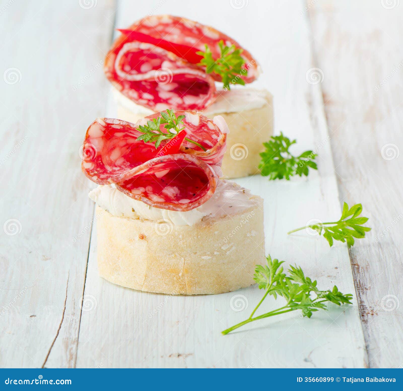 Baguette with Salami and Cream Cheese with Herbs. Stock Image Image