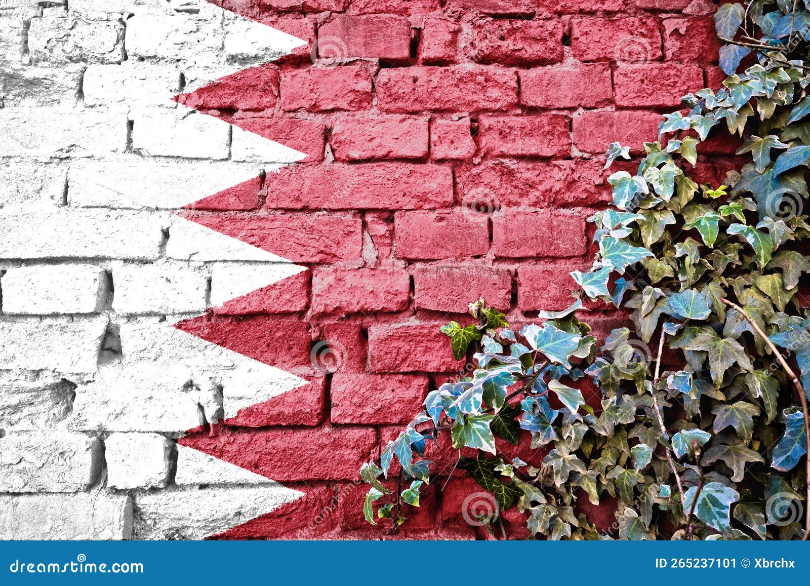 bahrein grunge flag on brick wall with ivy plant