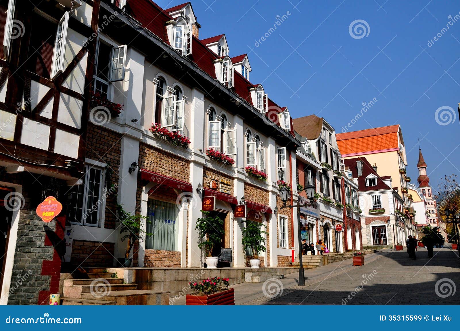 Bai Lu, China: Alsatian Style Buildings in Sino-French Village. View looking north on the principal street of the Sino-French village with its handsome French Alsatian style buildings in Bai Lu, China.