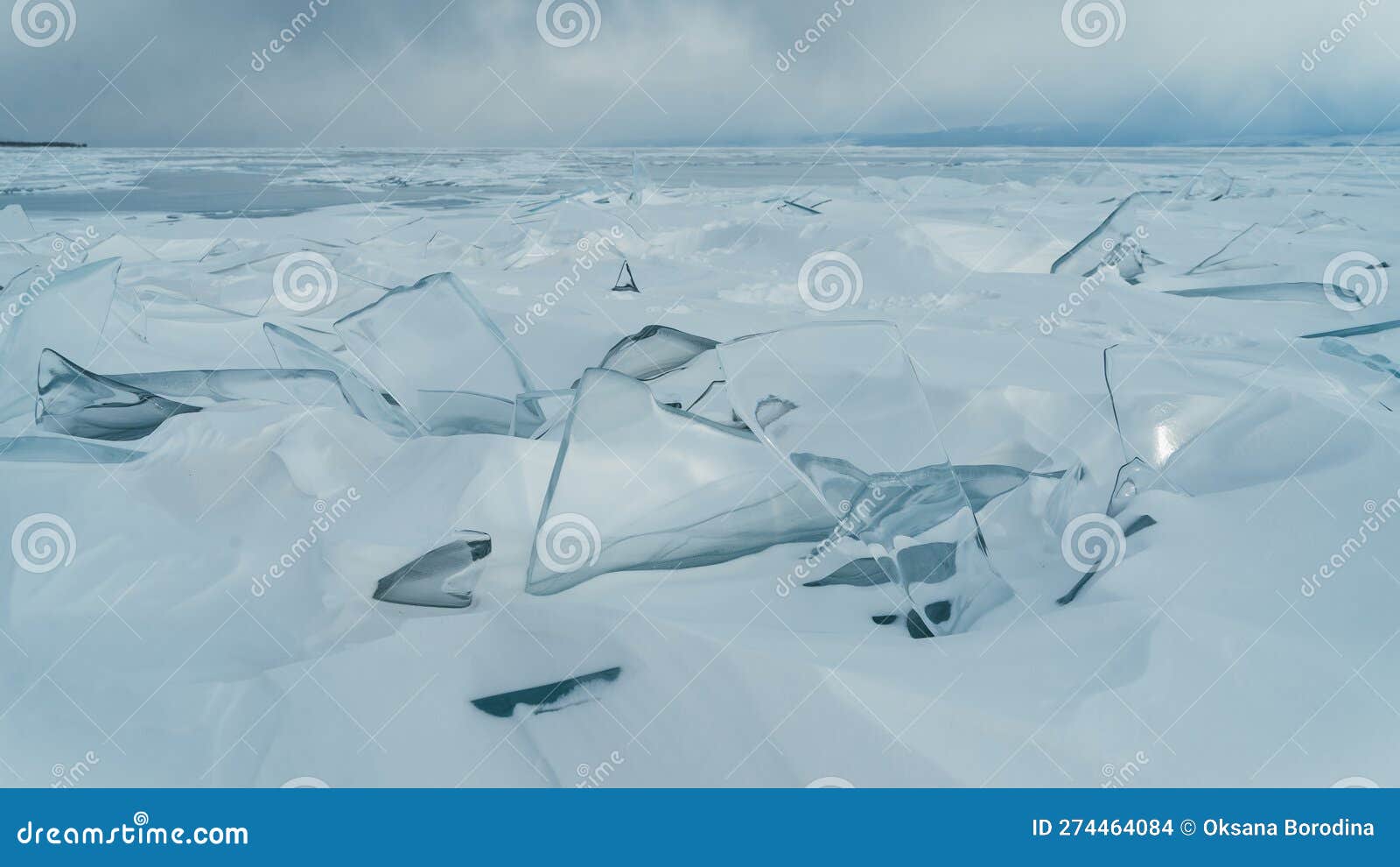 the baikal ice with cracks. close-up view. concept global warming, melting ice