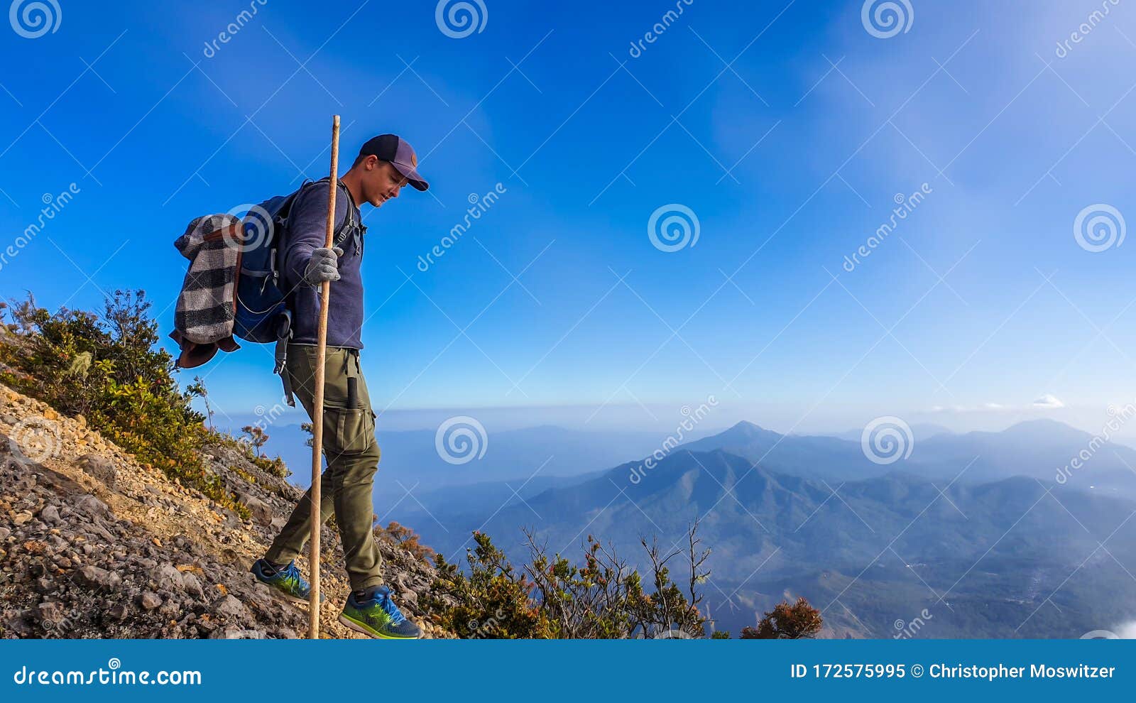 bajawa - a man walking down the volcano