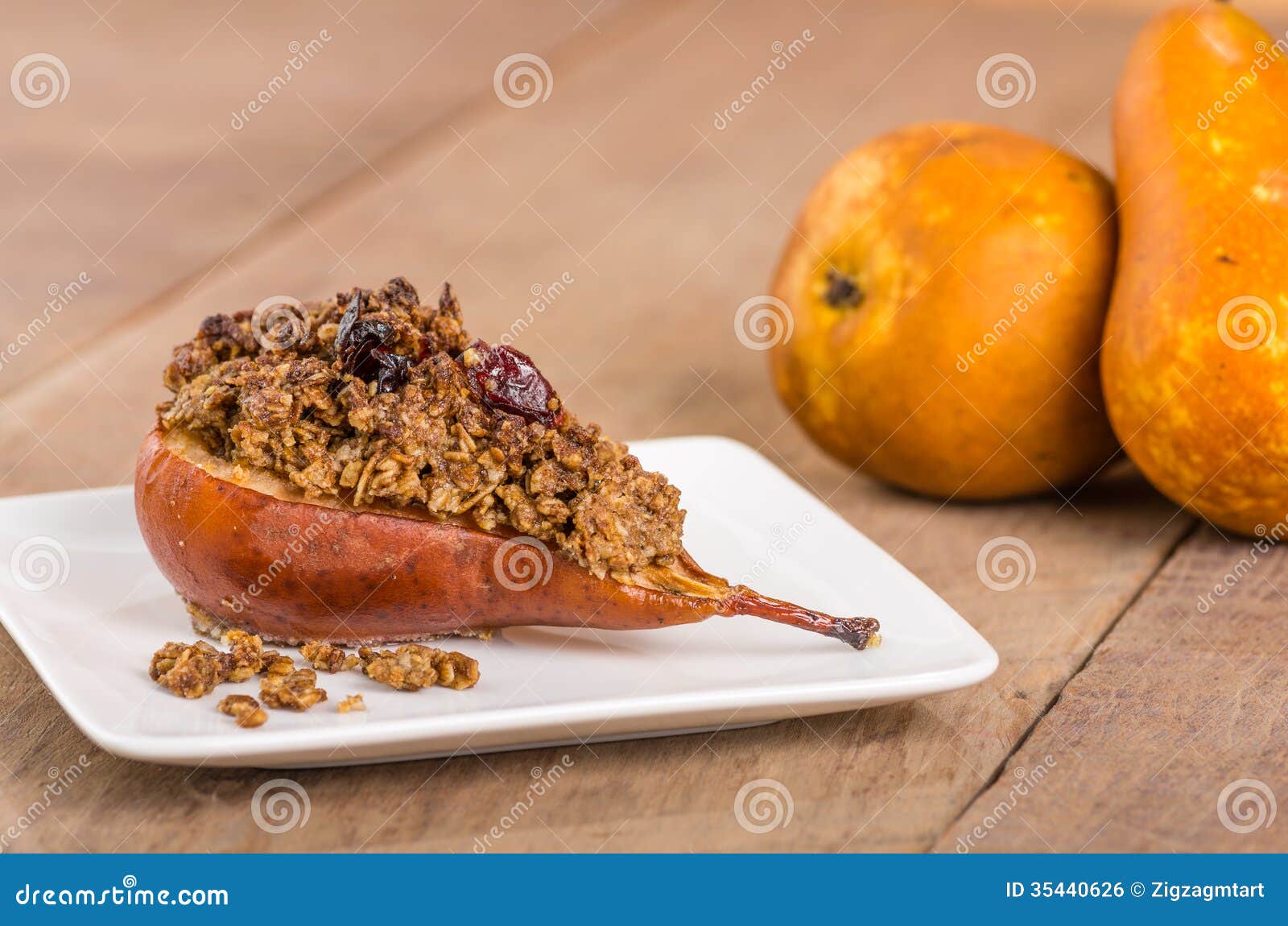 Baked Bosc Pear with Crumble Topping Stock Photo Image of cranberries