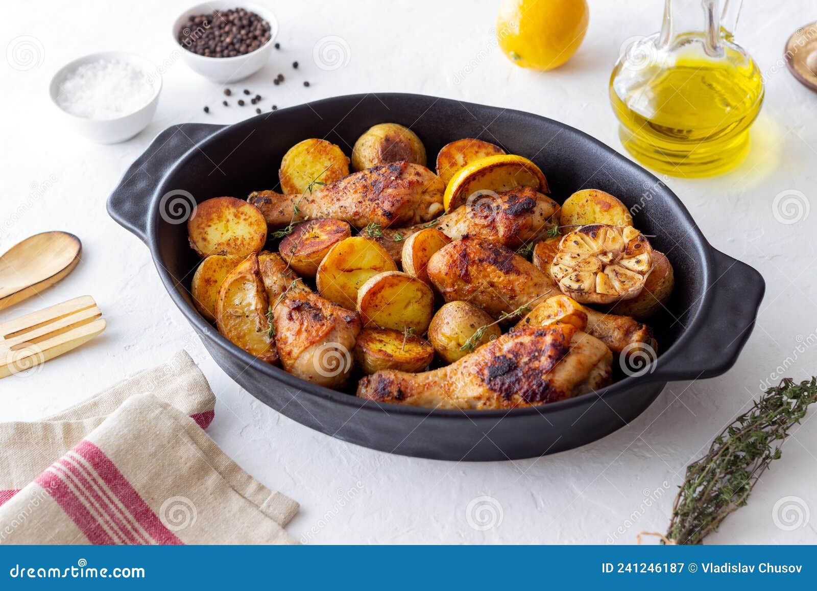 Baked Chicken Legs with Potatoes and Lemon. Recipe Stock Image - Image