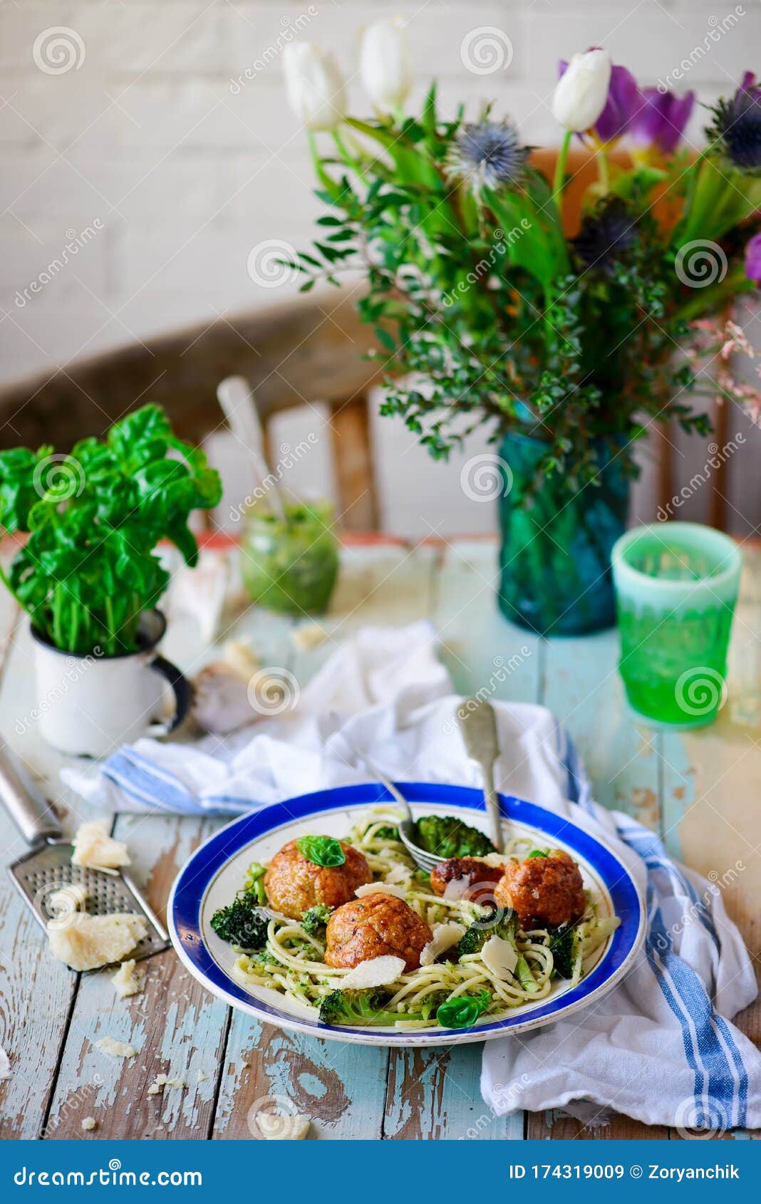 Baked Chicken Meatballs with Broccoli Pesto Pasta.. Style Rustic Stock