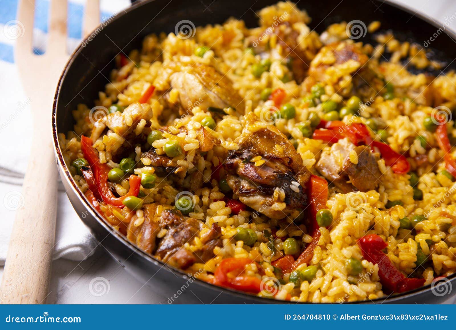 Baked Chicken Rice Paella with Vegetables. Traditional Spanish Recipe