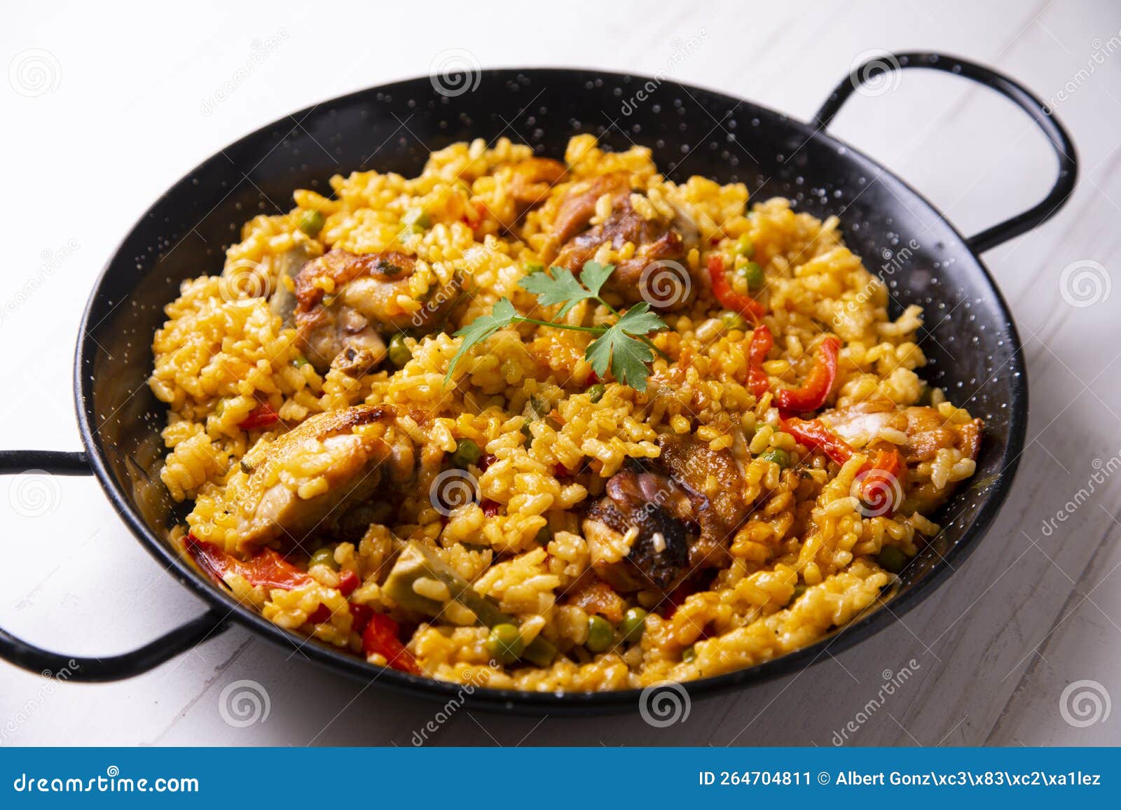 Baked Chicken Rice Paella with Vegetables. Traditional Spanish Recipe