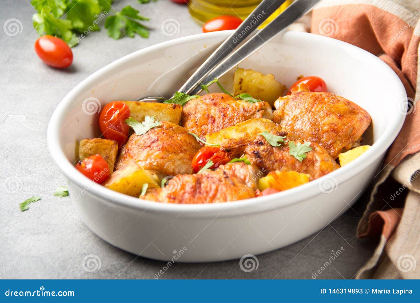 Baked Chicken Thighs (legs) with Crispy Crust, Potatoes and Cherry