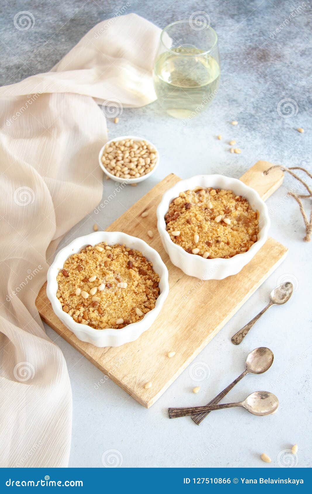 Baked Dessert with Pear and Nuts in a Small White Bowl Stock Photo ...