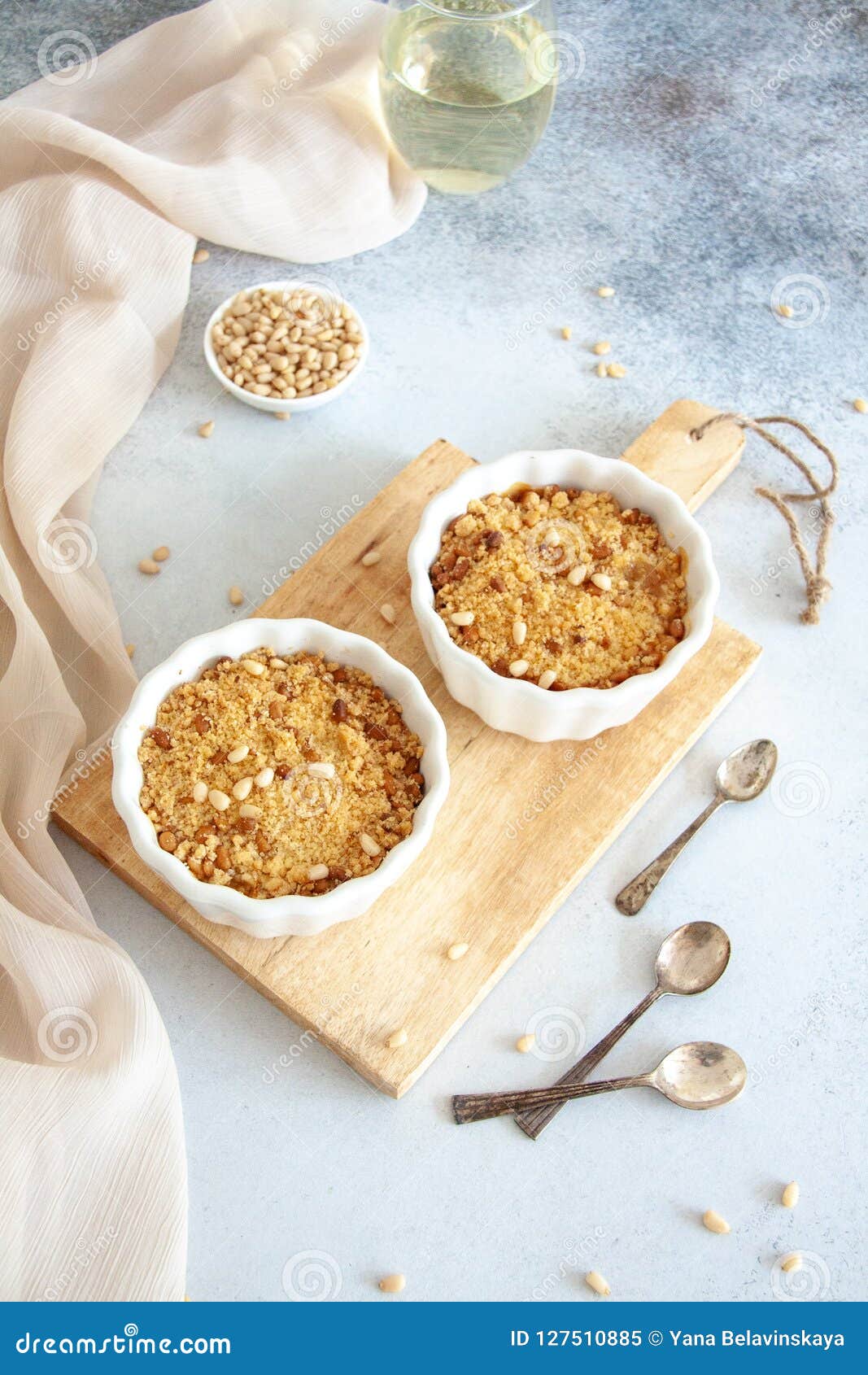 Baked Dessert with Pear and Nuts in a Small White Bowl Stock Image ...
