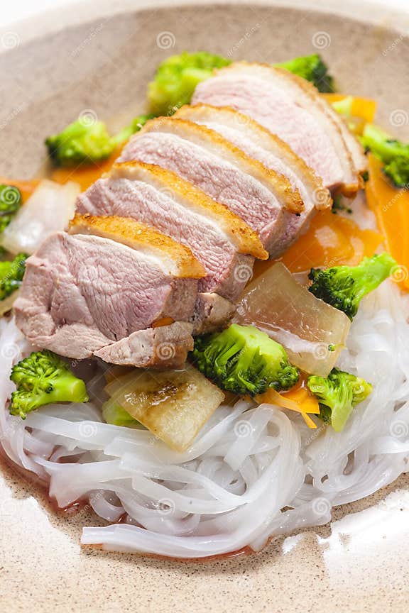 Baked Duck Breast with Vegetables and Rice Noodles Stock Photo - Image