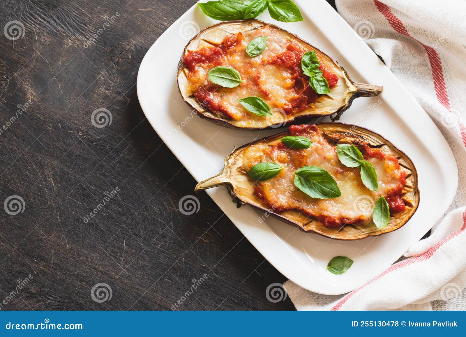 Baked Eggplant with Tomatoes and Mozzarella and Basil Stock Photo