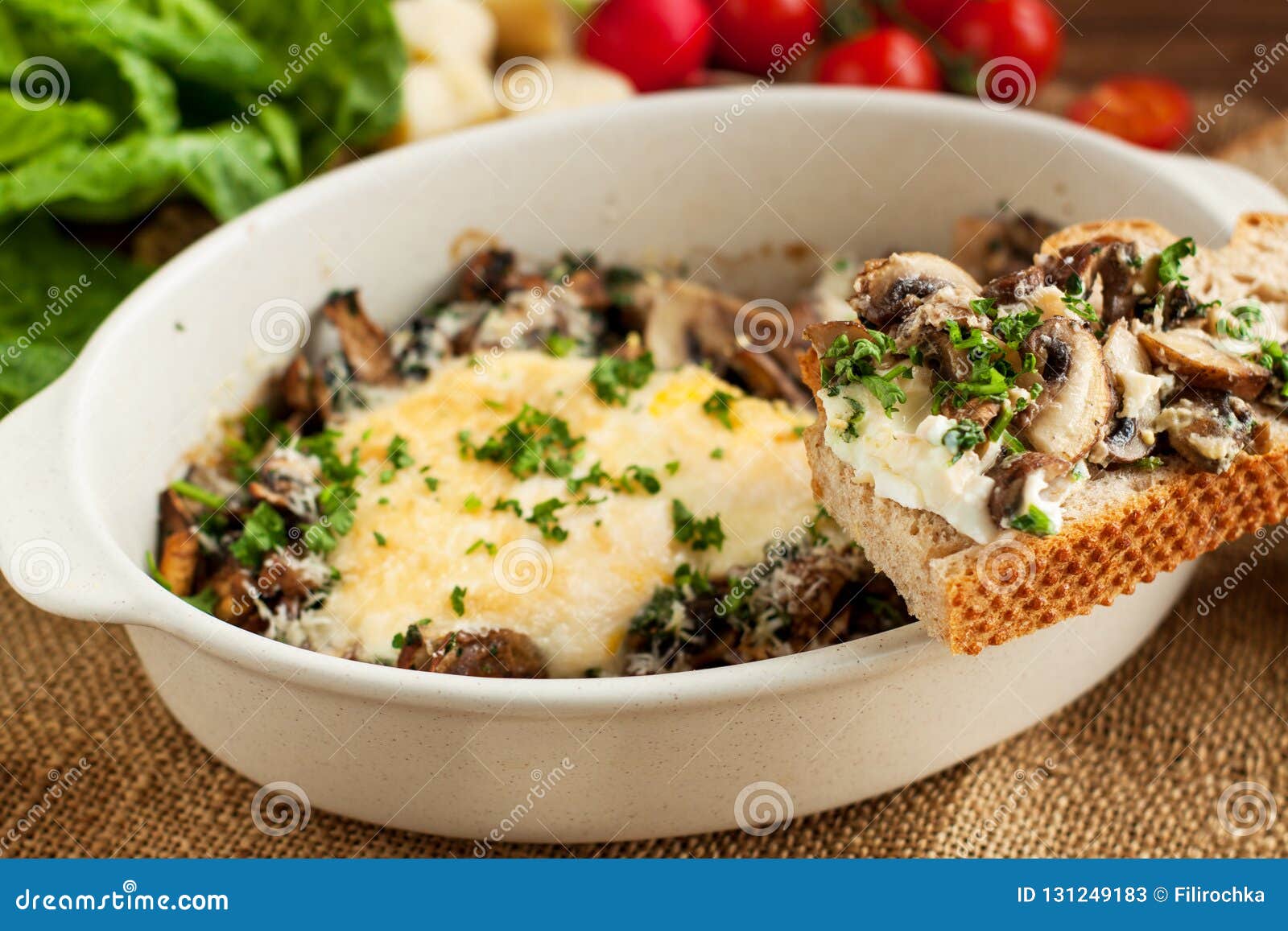 Baked Eggs with Mushrooms with Wholemeal Bread Stock Image - Image of