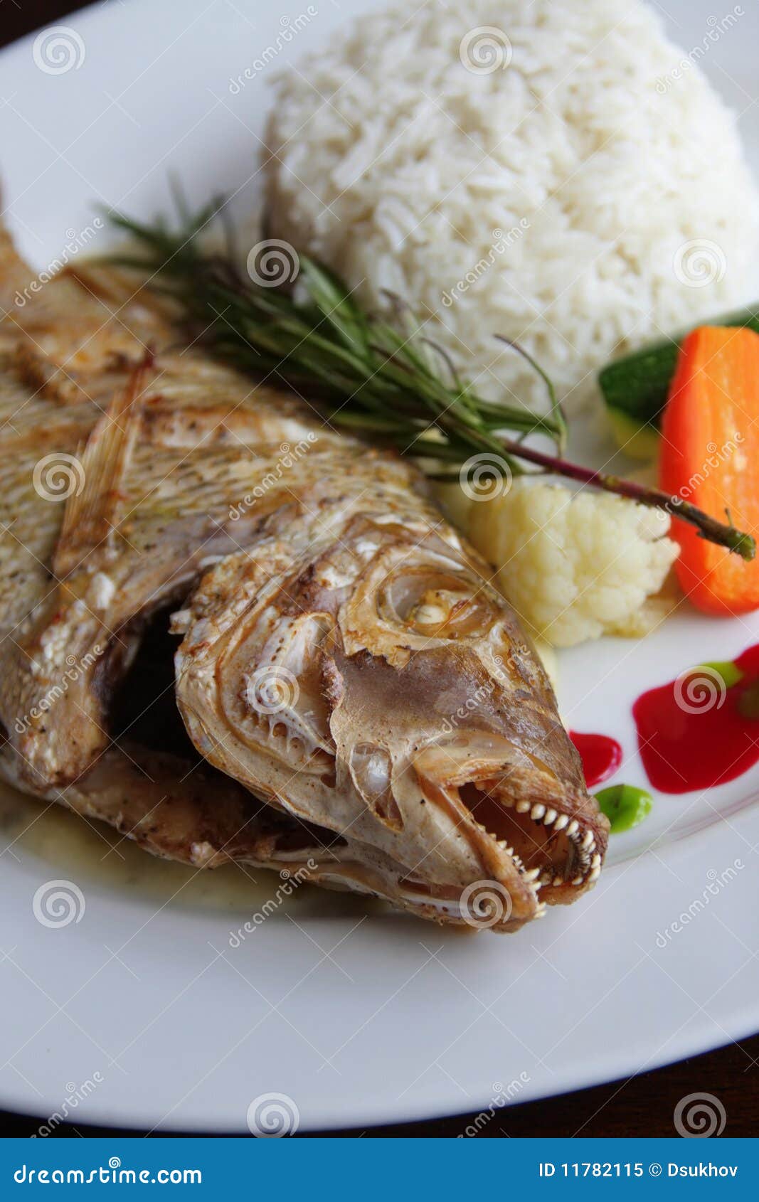 Baked exotic fish on dish stock image. Image of grilled 11782115