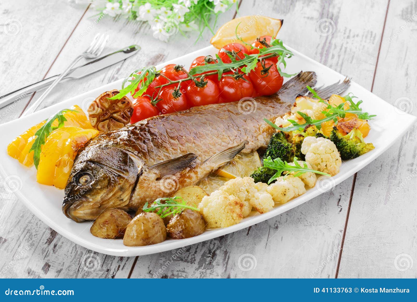 Baked fish with vegetables stock image. Image of fresh 41133763
