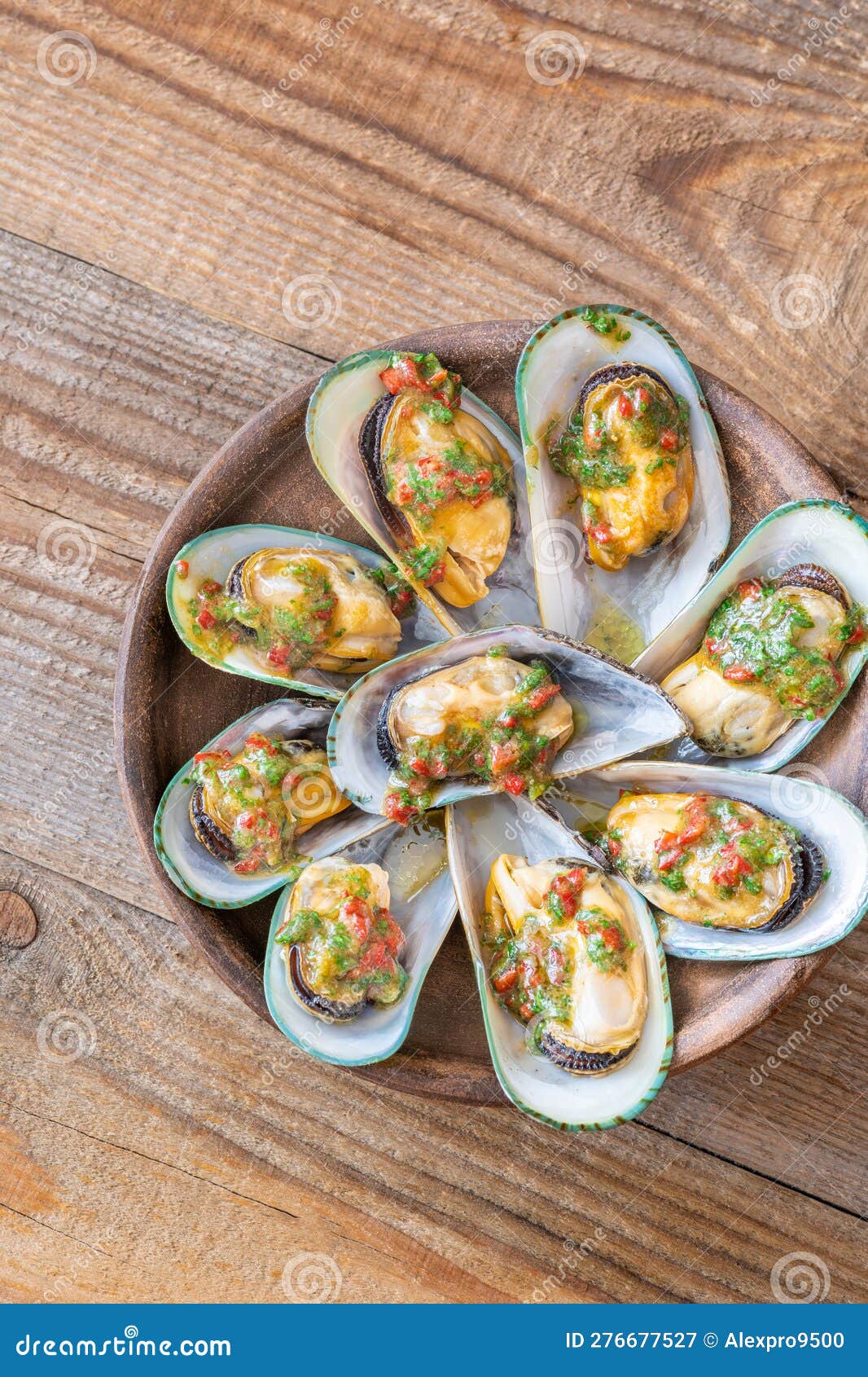 Baked half shell mussels stock image. Image of background 276677527