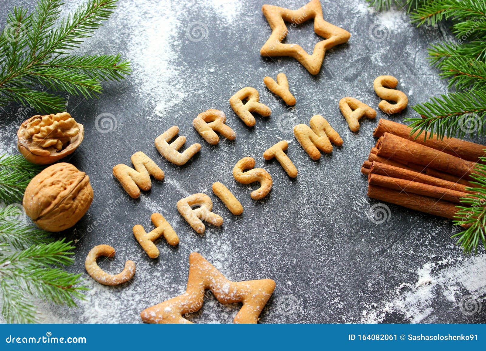 baked letters merry christmas, stars, snowflakes.greeting card with gingerbread.