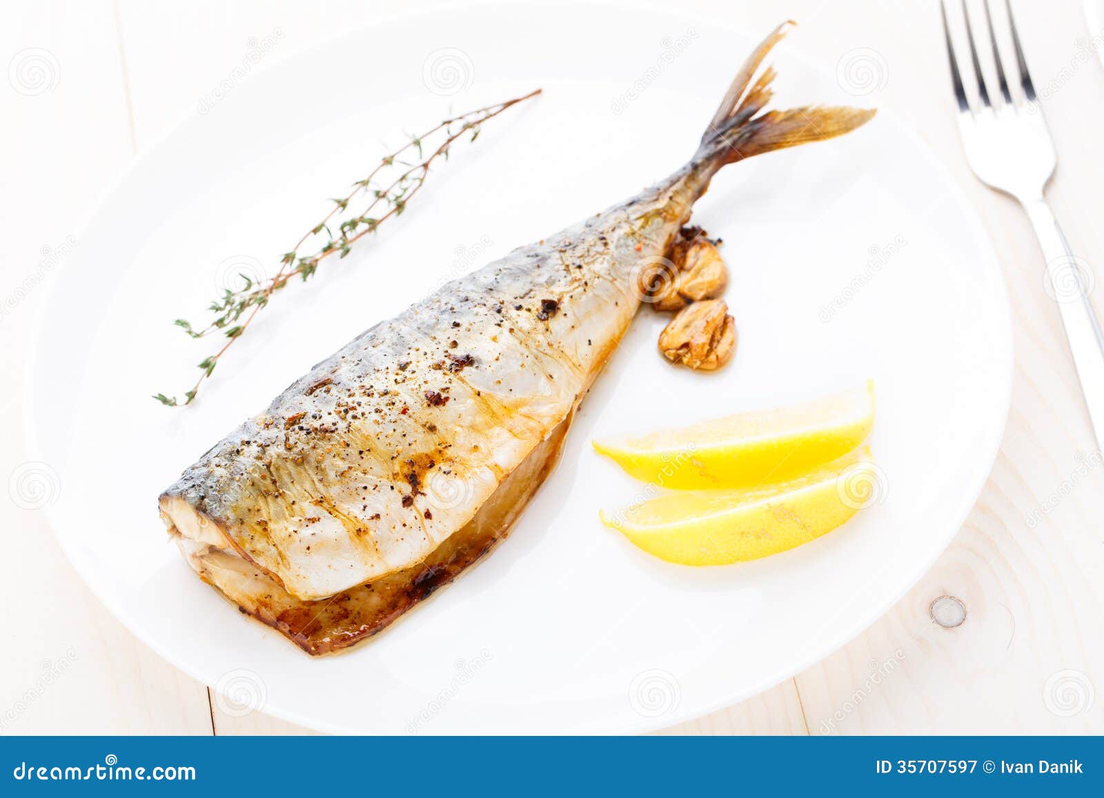 Baked mackerel stock image. Image of food, seafood, herb 35707597