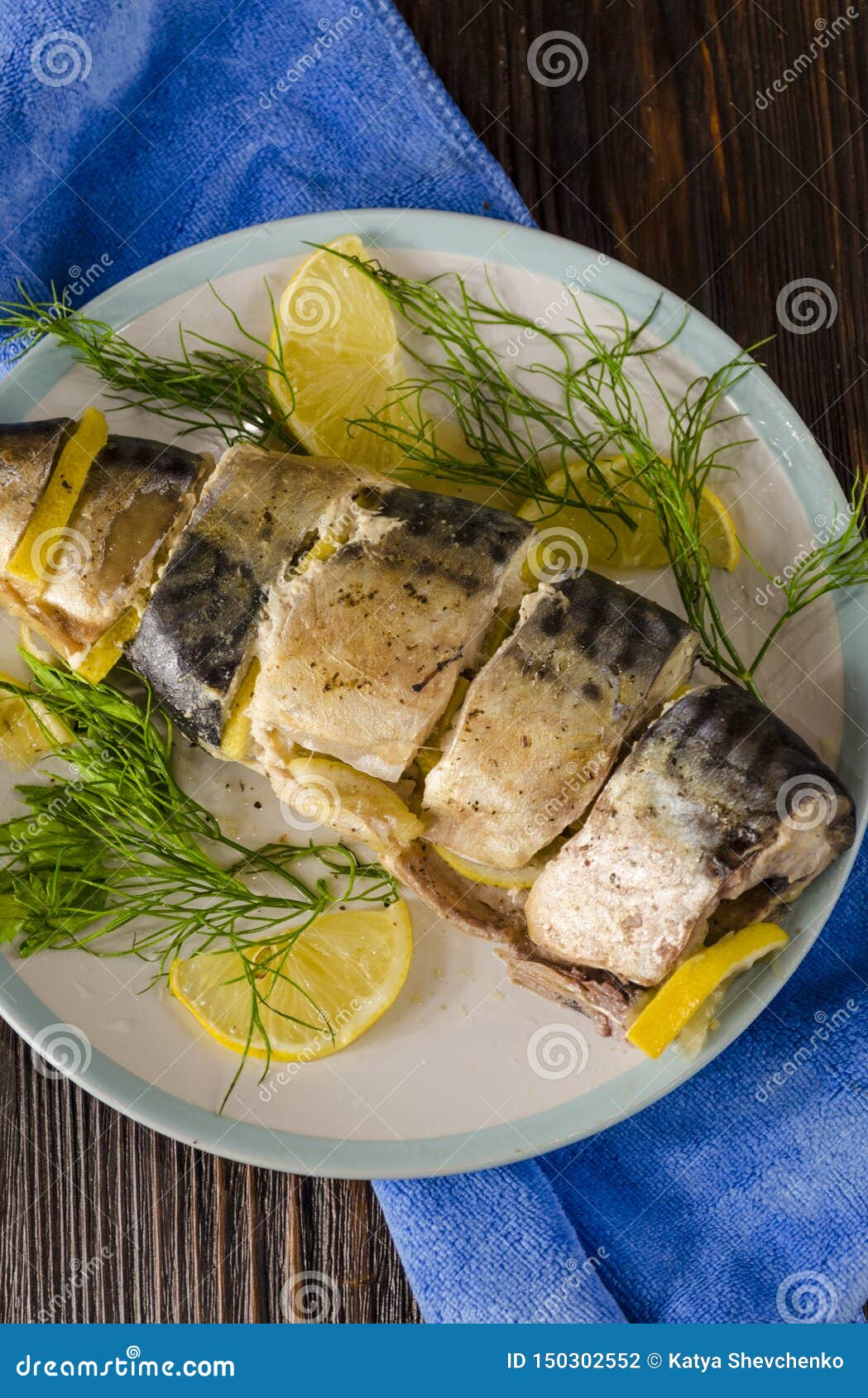 Baked mackerel with lemon stock photo. Image of seafood - 150302552