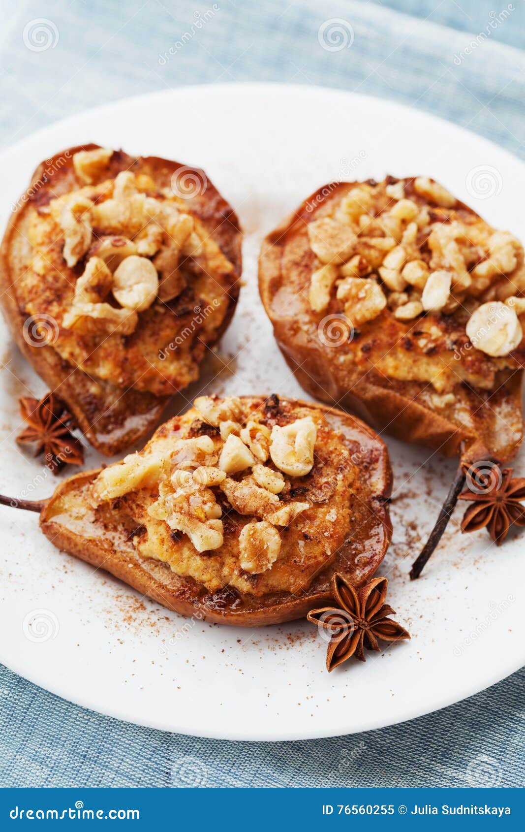 Baked Pears with Ricotta, Walnuts, Honey and Cinnamon in a White Plate ...