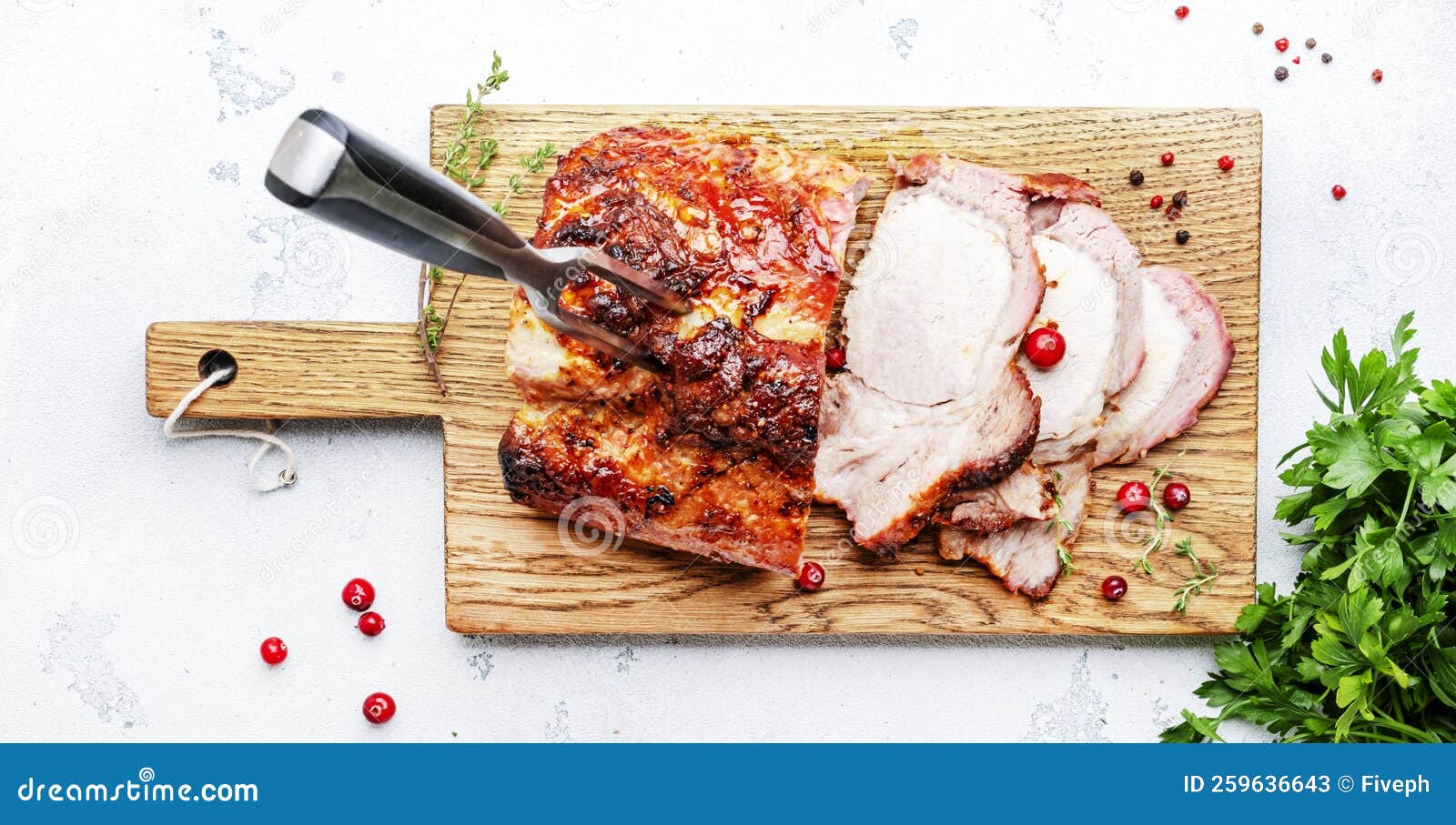 Baked Pork Loin, Whole and Cut Meat Pieces on Cutting Board with Spices