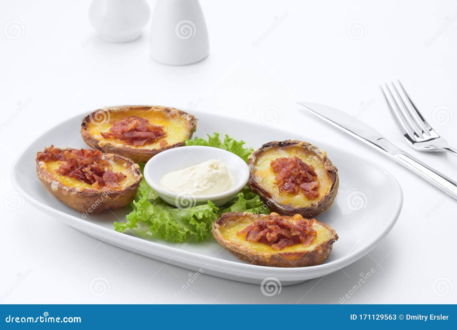 Potato Halves Fried and Filled with Cheese and Bacon Stock Image