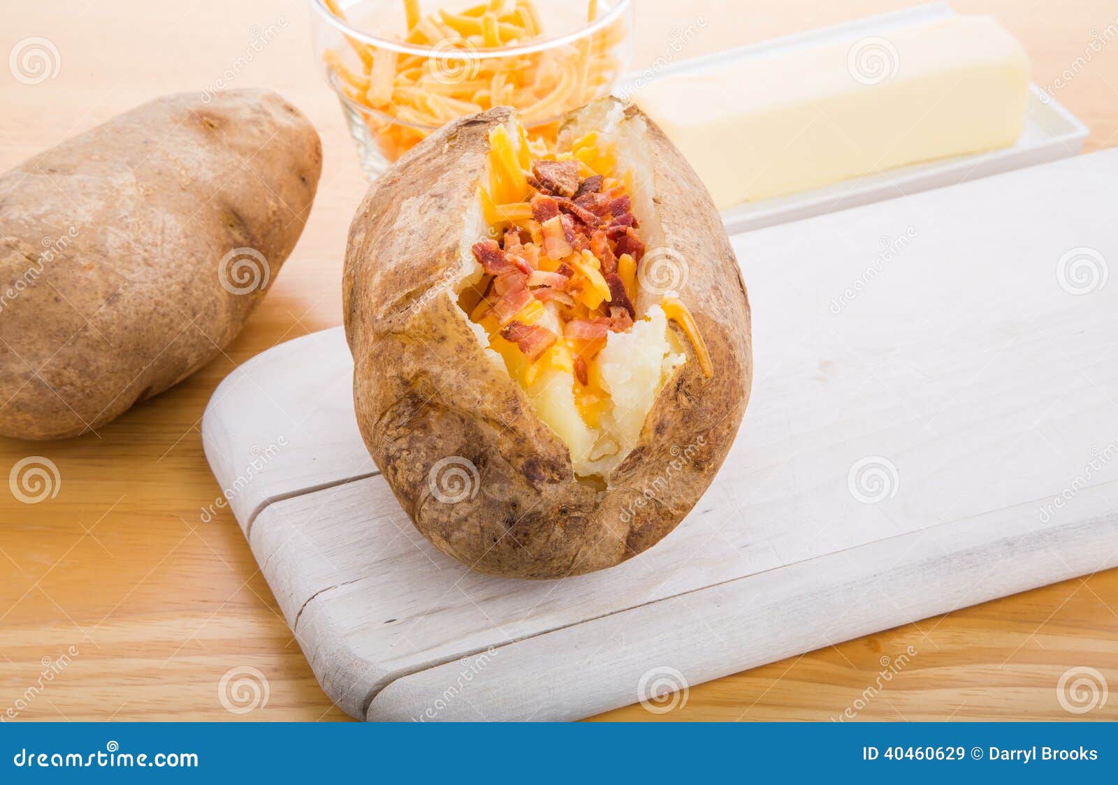 Baked Potatoes With Bacon And Cheese Stock Image - Image of baked