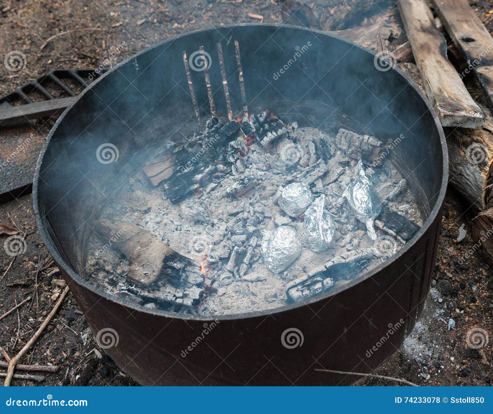 Baked Potatoes in Camp Fire Pit Stock Photo Image of flame, roasted