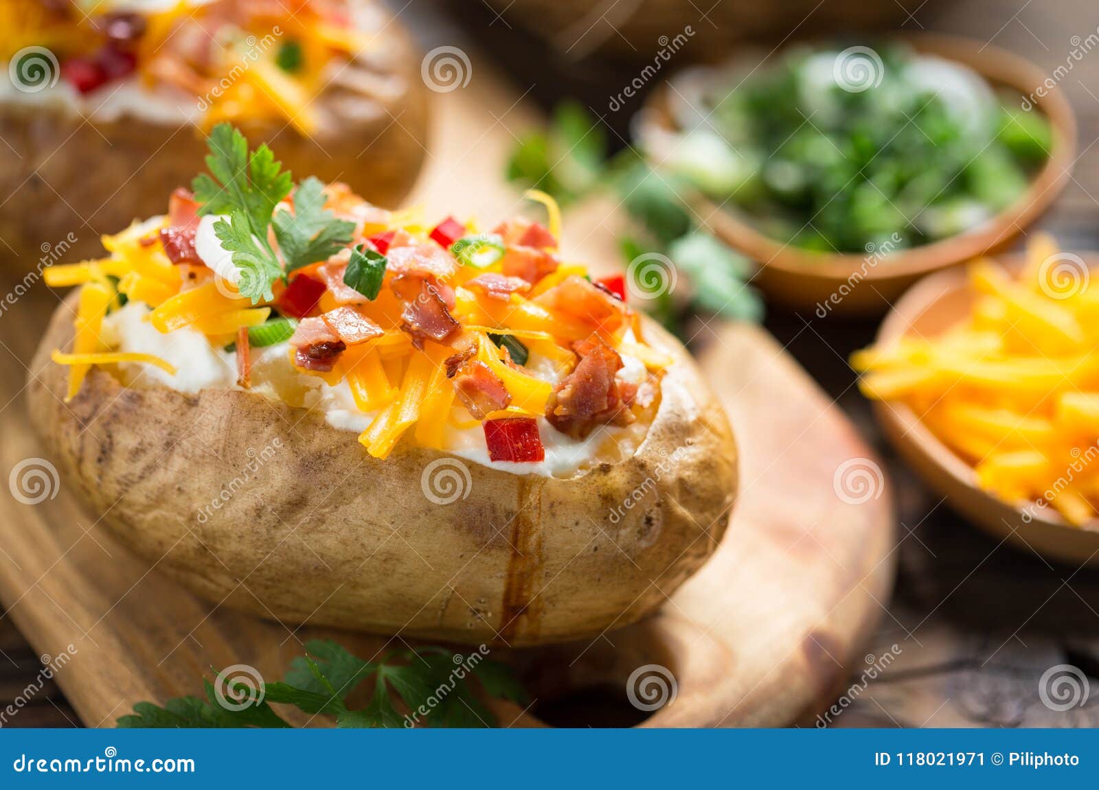 baked potatoes with cheese and bacon