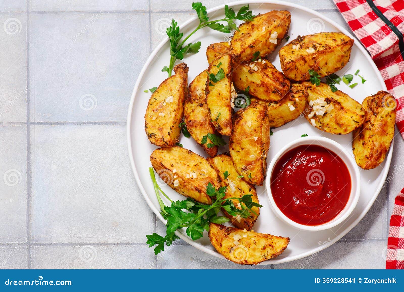 baked potatoes in country style with ketchup.style rustic.selective focus