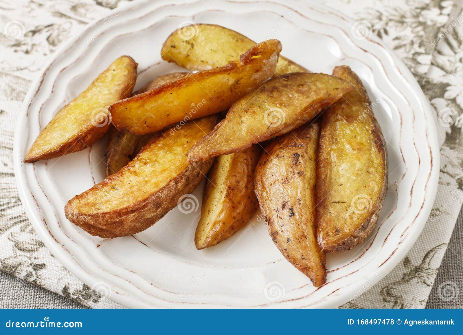 Baked potatoes dish stock photo. Image of menu, roasted - 168497478