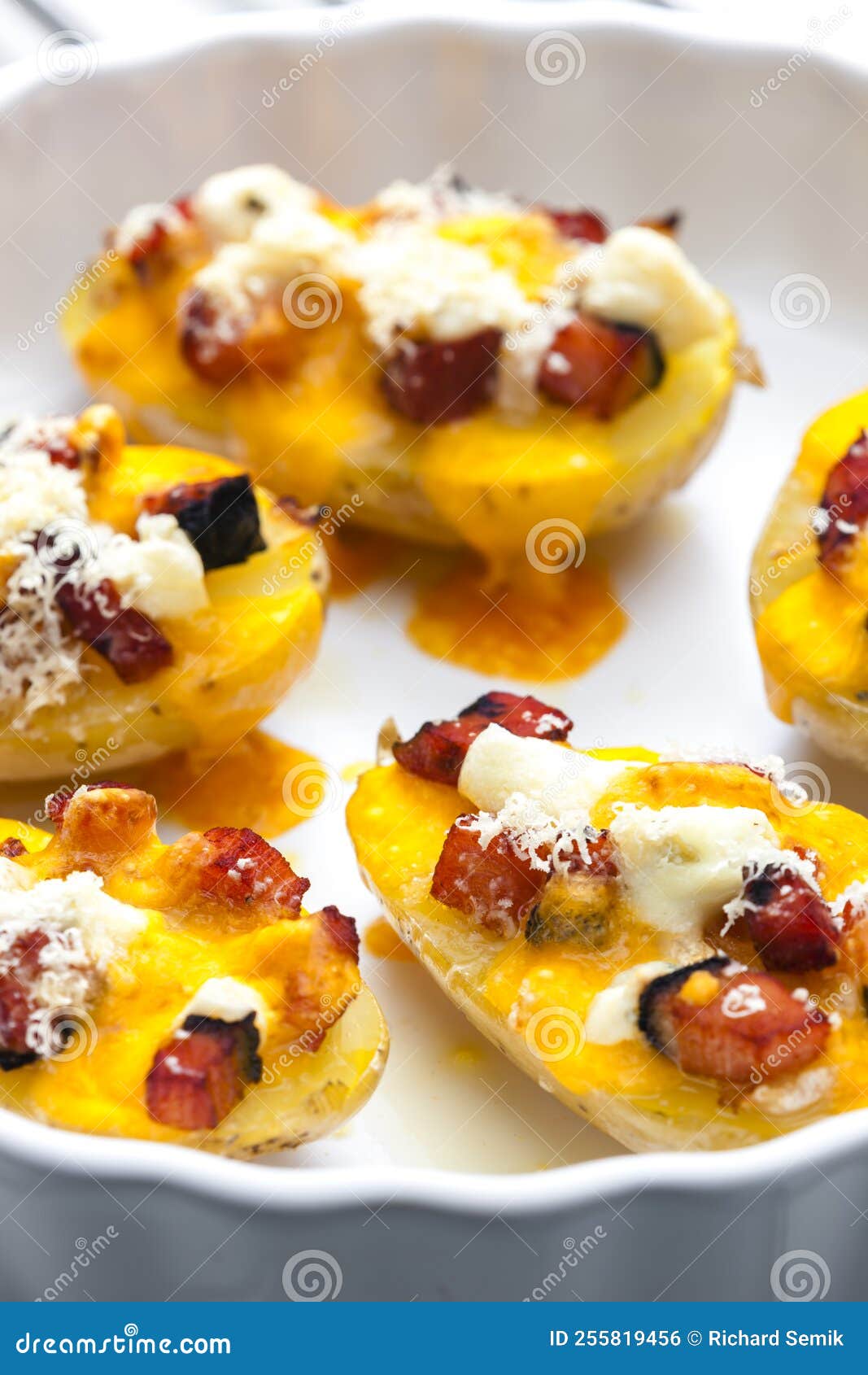 Baked Potatoes Filled with Cheese and Bacon Stock Photo - Image of meal