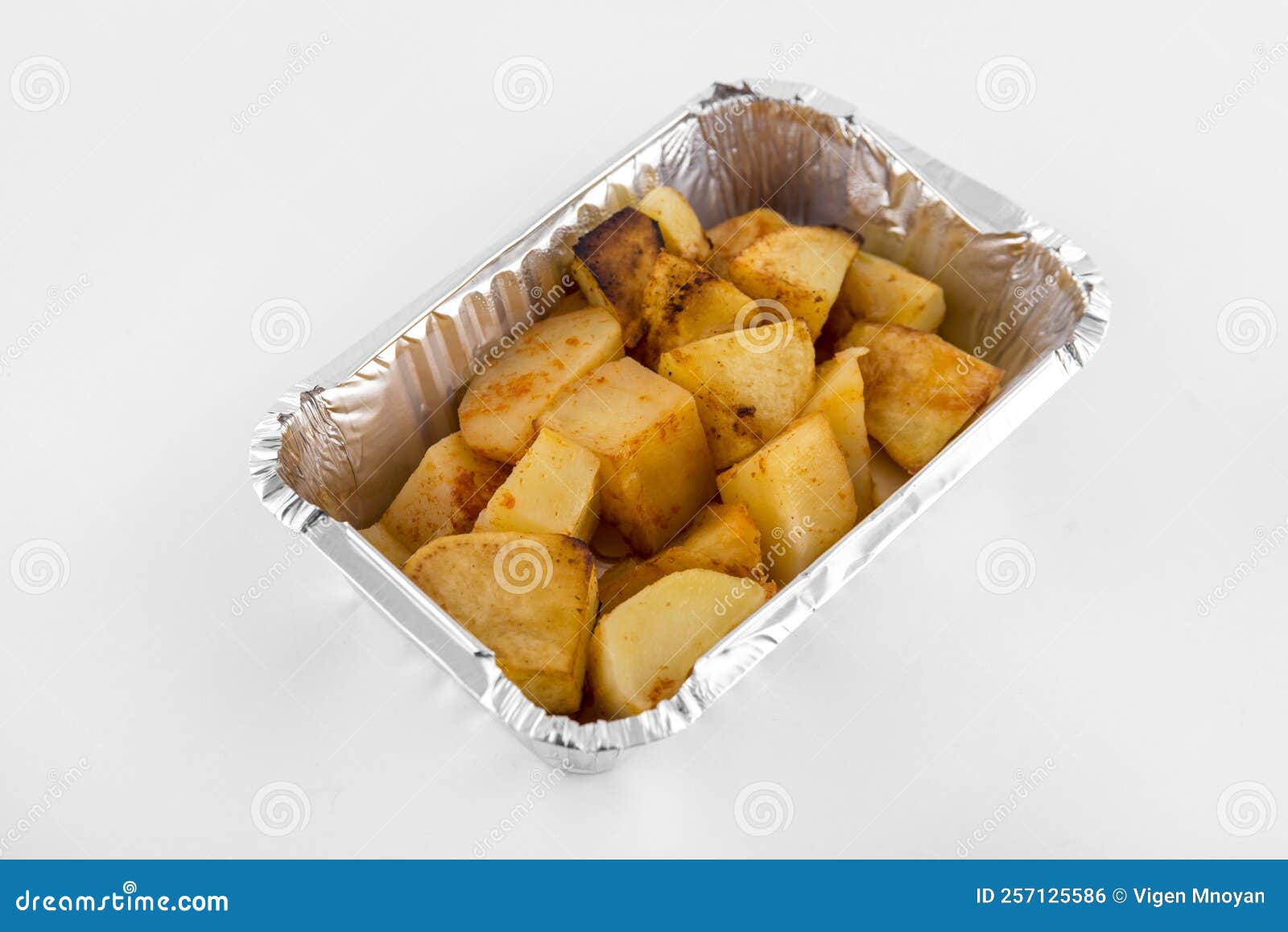 Baked Potatoes Served in Aluminium Tray . Stock Photo Image of meal