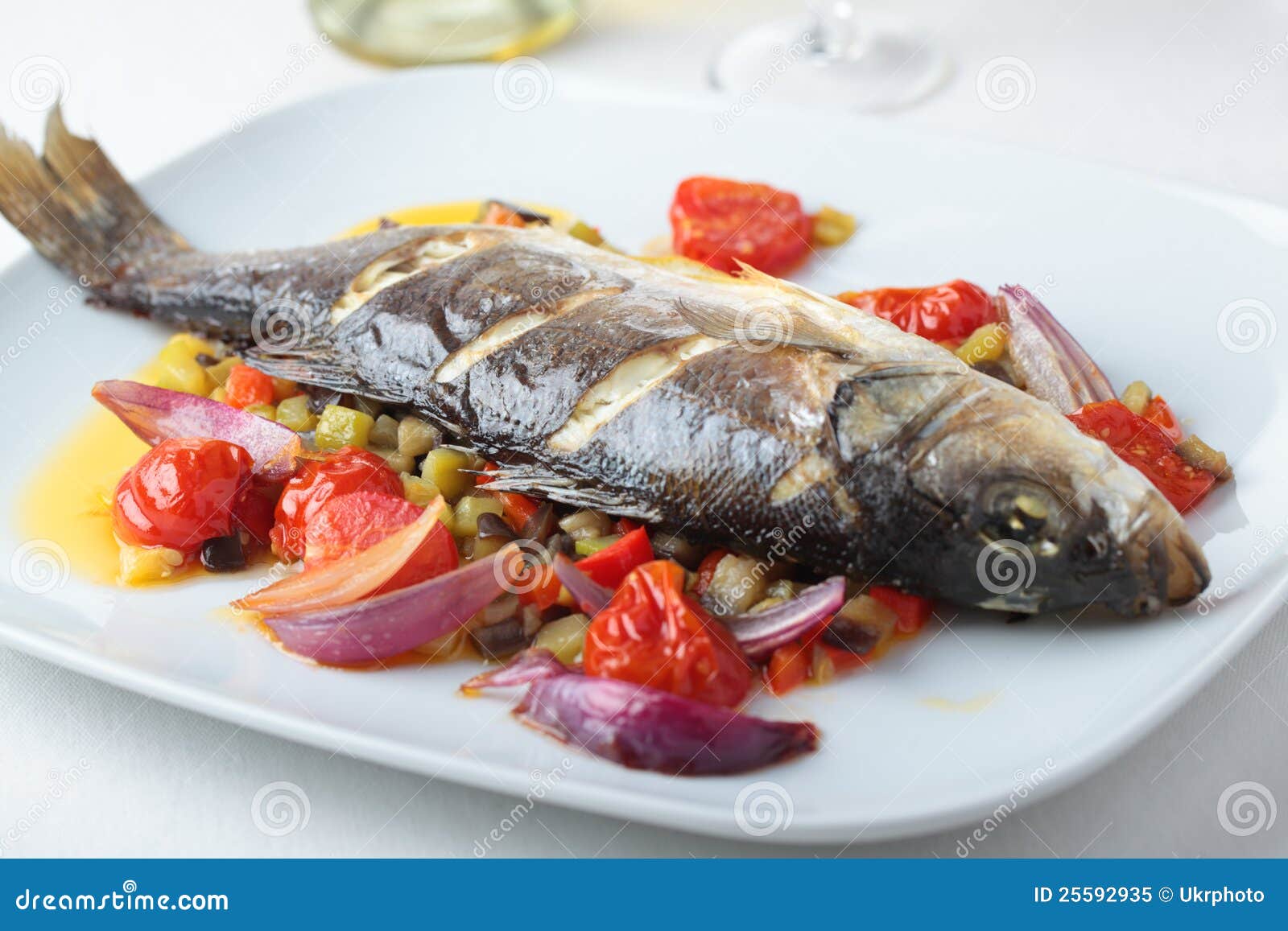 Baked Sea Bass with Vegetables Stock Image Image of onion, lunch