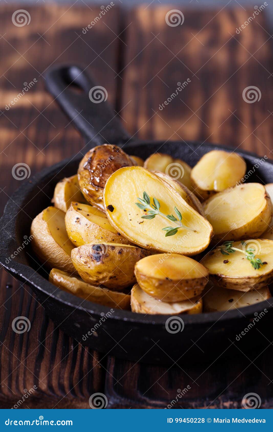Baked Spicy Potatoes with Thyme on Parchment Stock Photo - Image of ...
