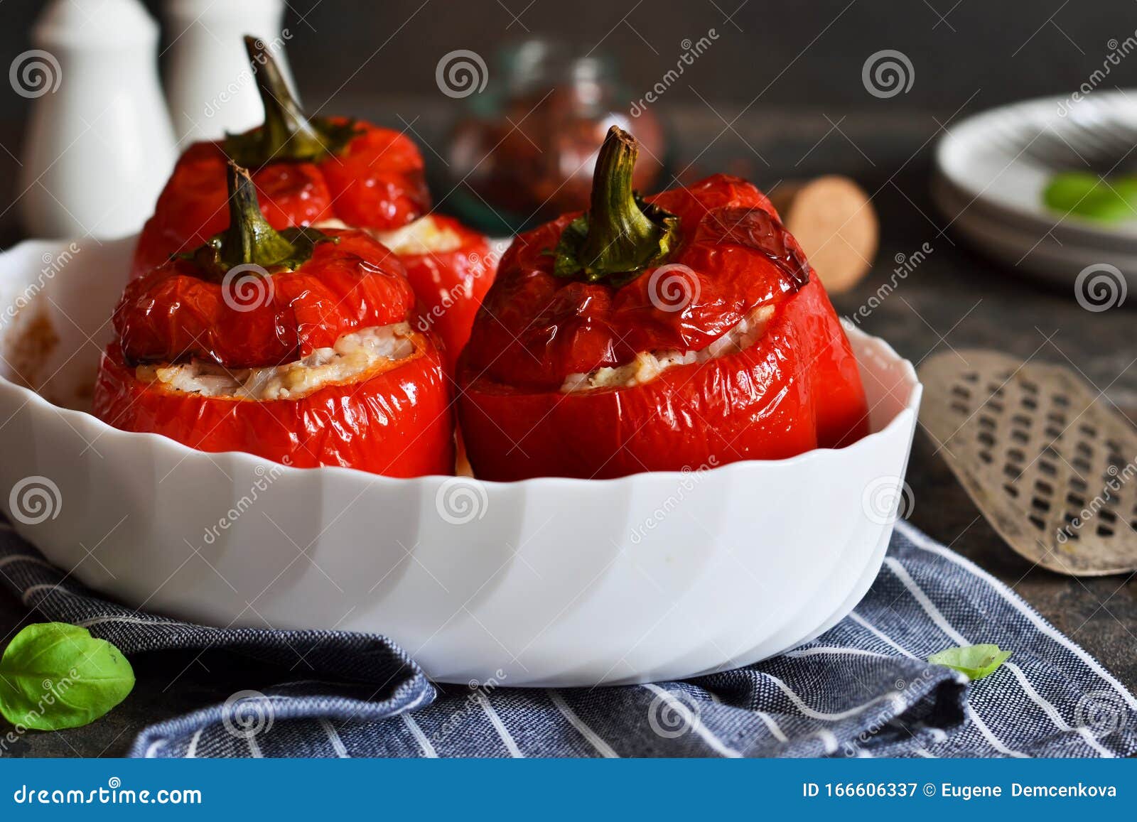 Baked Stuffed Peppers with Meat and Rice on a Concrete Background Stock