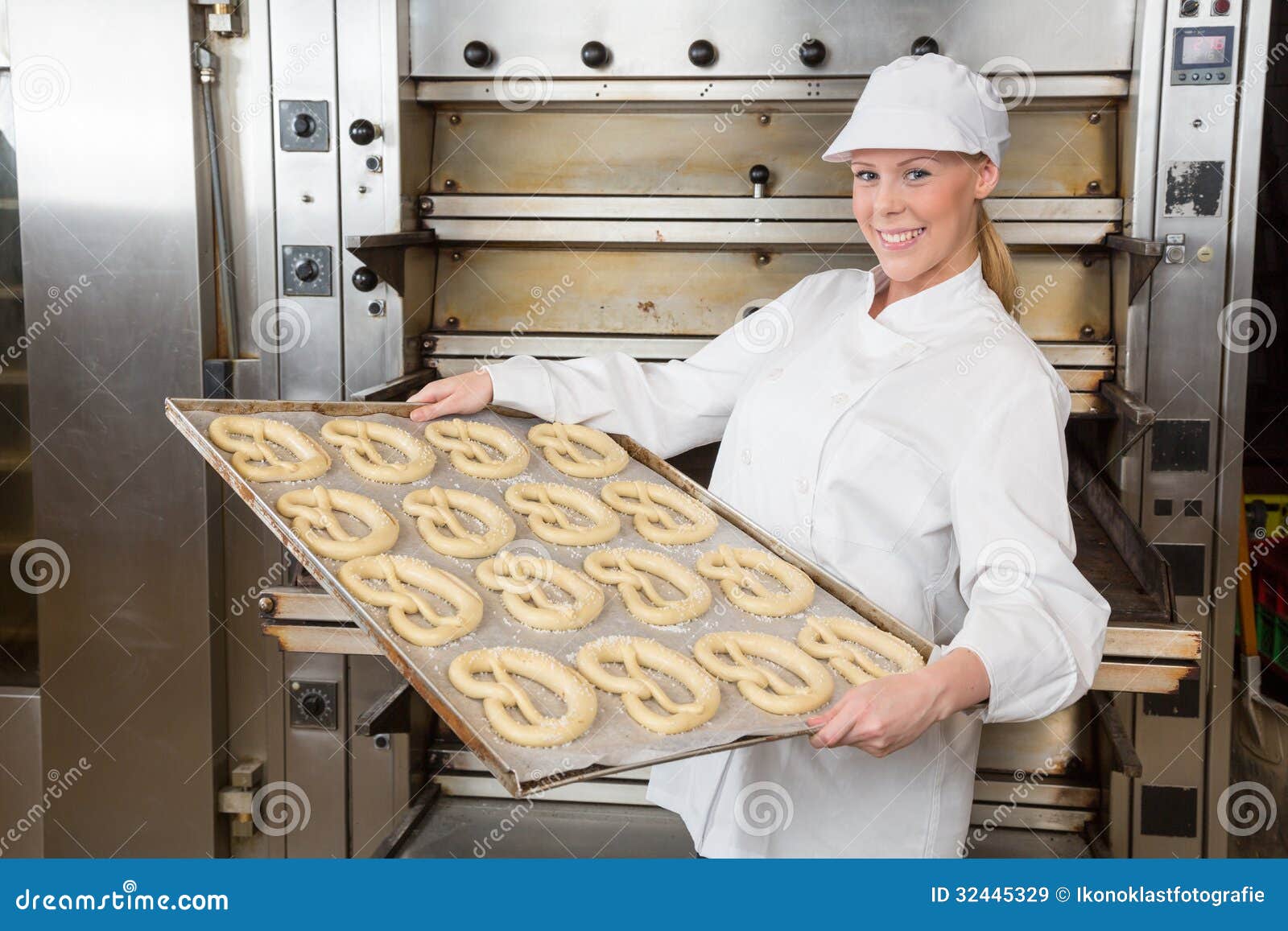 Baker in Bakery with Baking Plate Full of Pretzels Stock Image Image of handwork, pretzels