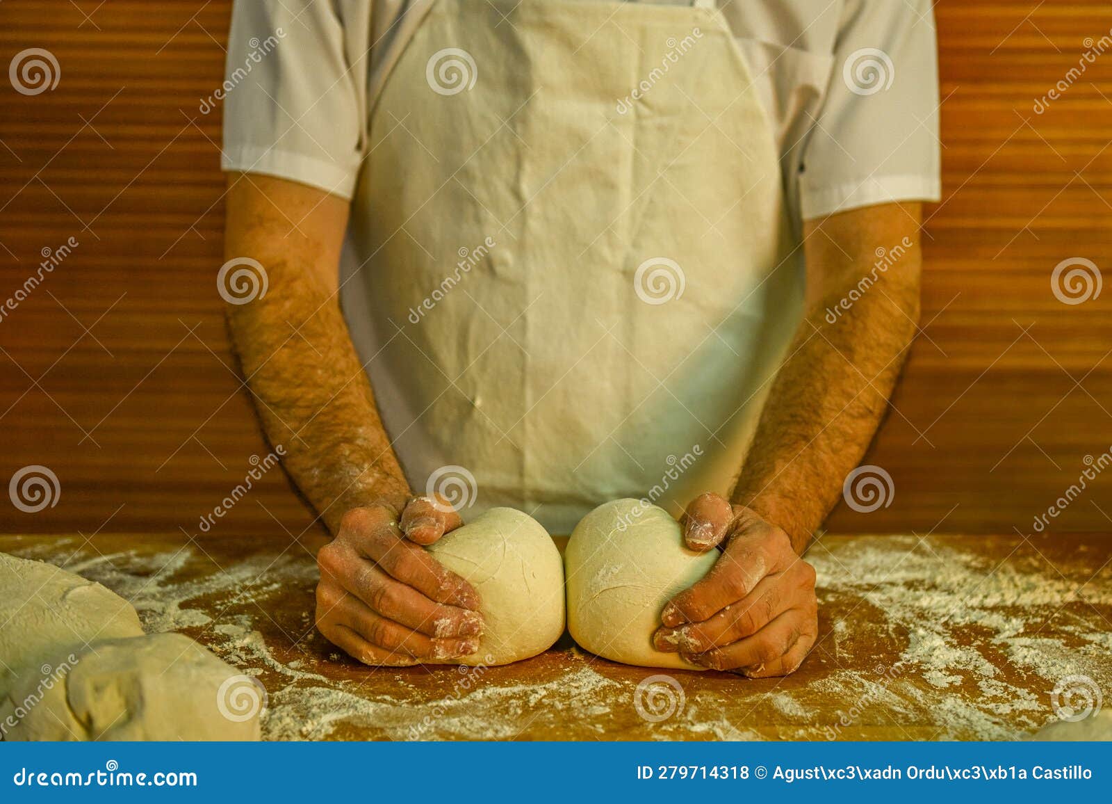 Baker Kneading Artisan Bread in the Bakery. Stock Photo Image of