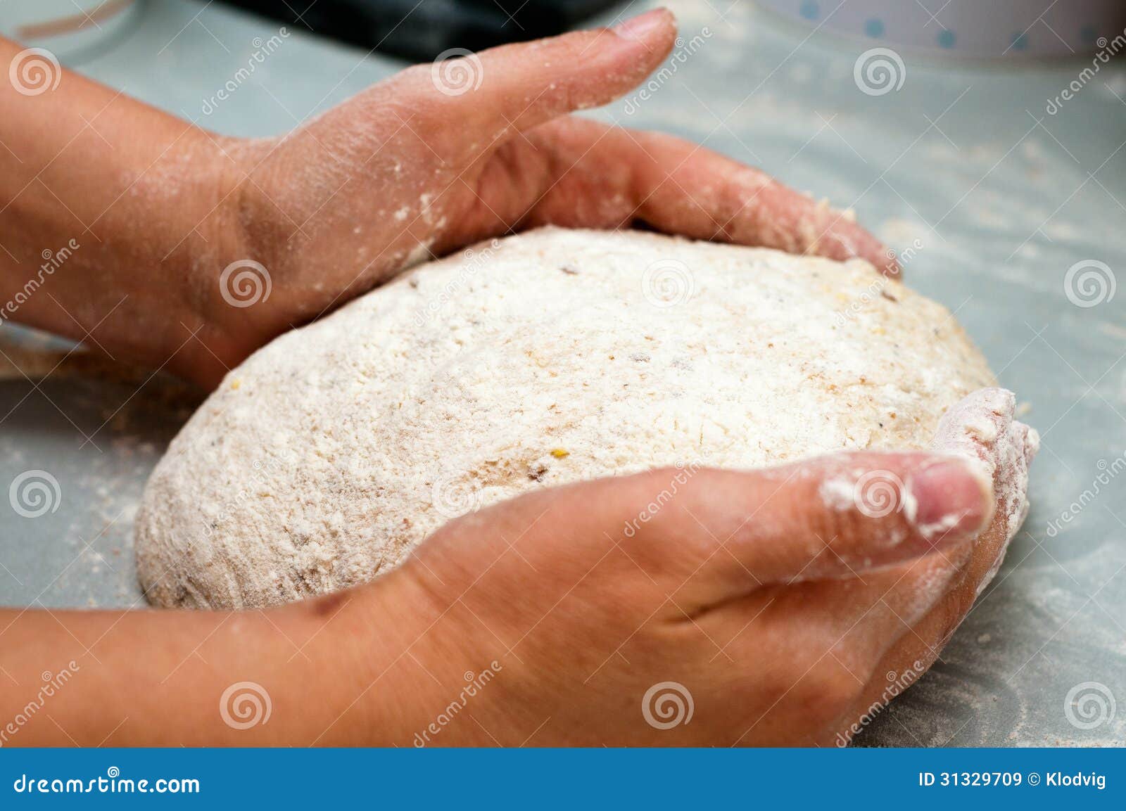 baker shaping load of bread