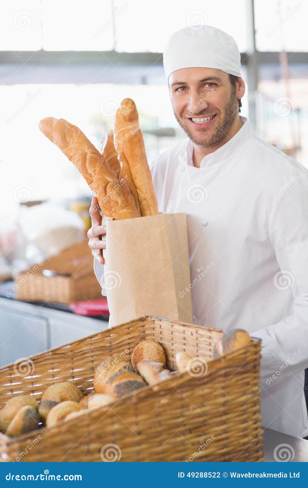Baker Showing Basket of Bread Stock Photo Image of professional