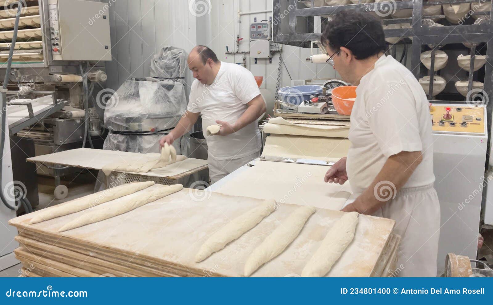 bakers working in industrial bakery