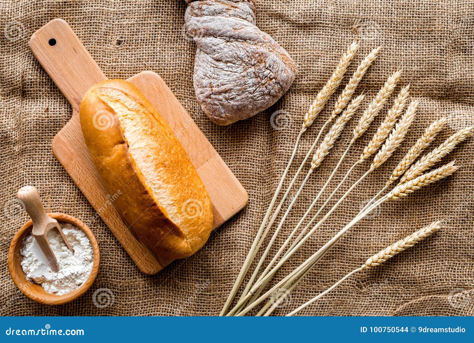 Baking Bread with Wheat Flour and Ears on Table Rystic Background Top