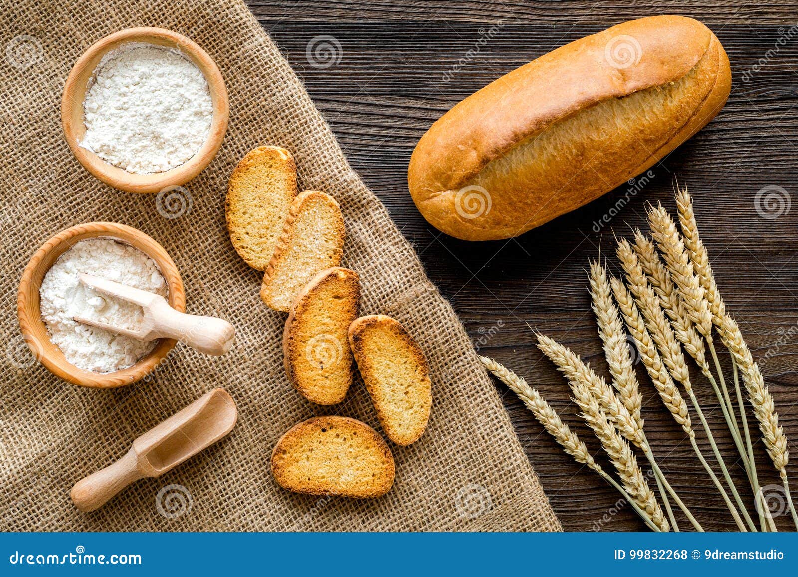 Baking Bread with Wheat Flour and Ears on Table Rystic Background Top