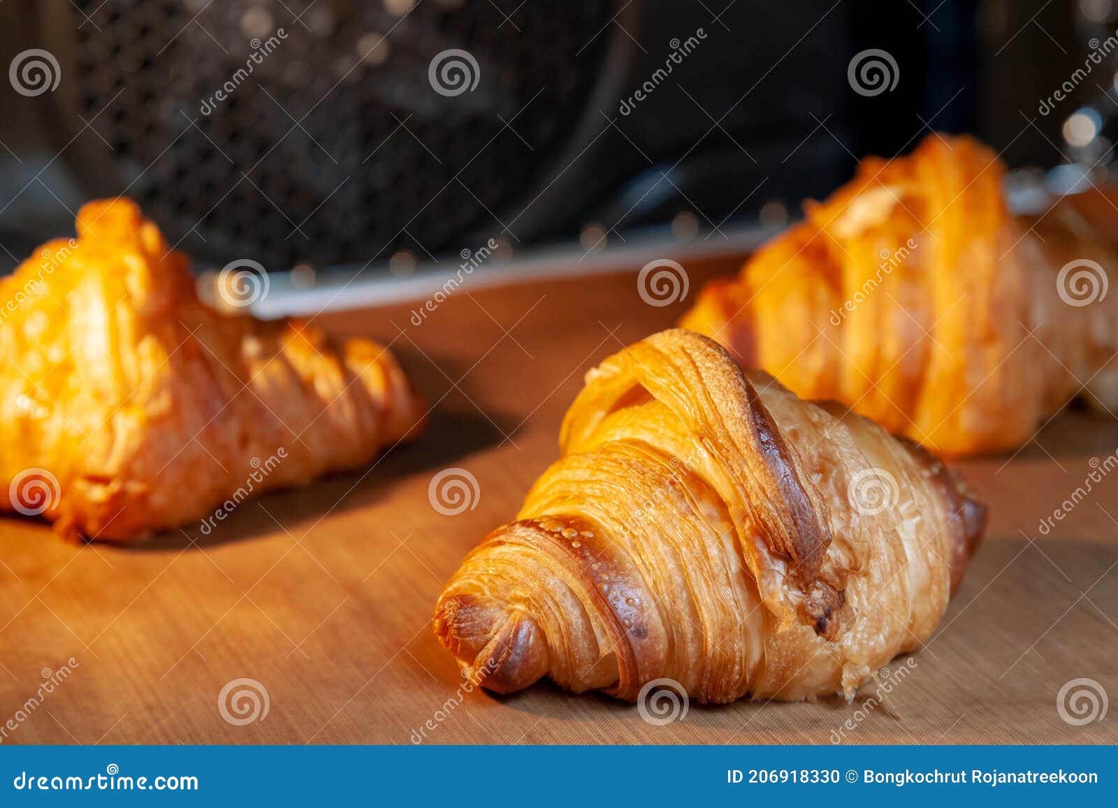 Baking Croissants in an Oven. Stock Photo Image of freshness